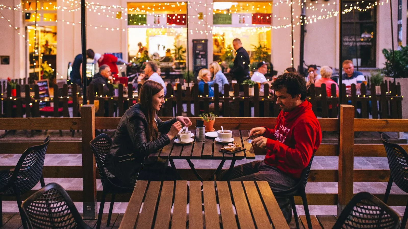 A couple having dinner at a restaurant